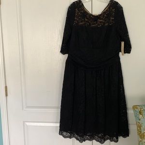Plus size black lace cocktail dress.